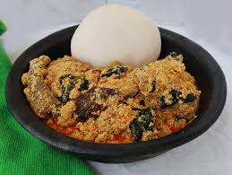 Egusi soup, swallow with Catfish 
